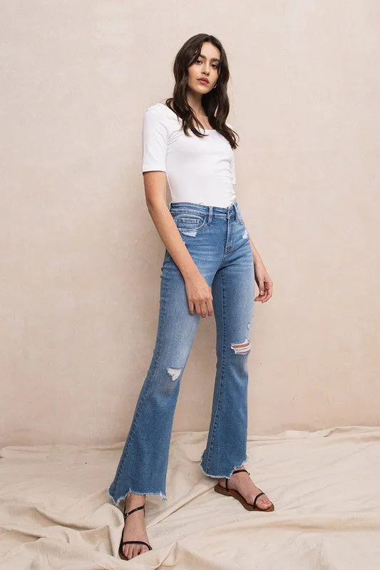 MID-RISE FLARE WITH HEM DETAIL