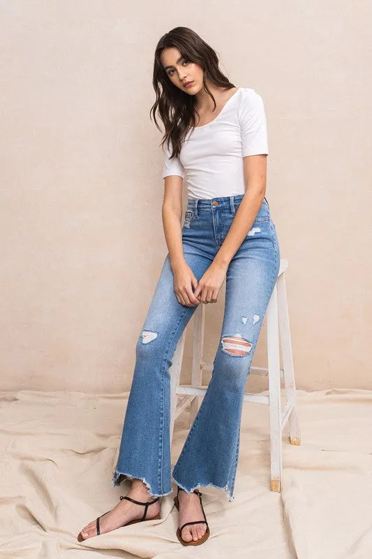MID-RISE FLARE WITH HEM DETAIL