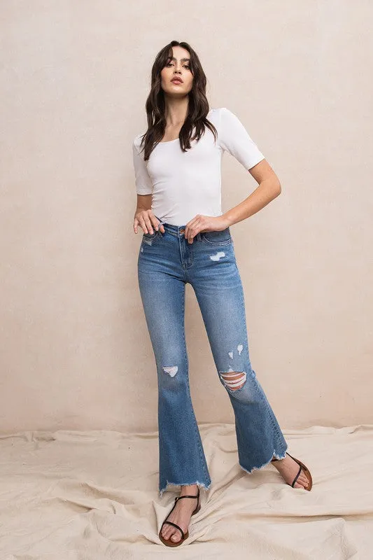 MID-RISE FLARE WITH HEM DETAIL